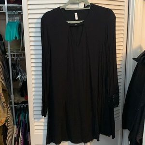 Black gauzy flowy tunic with great detail at neck and sleeves